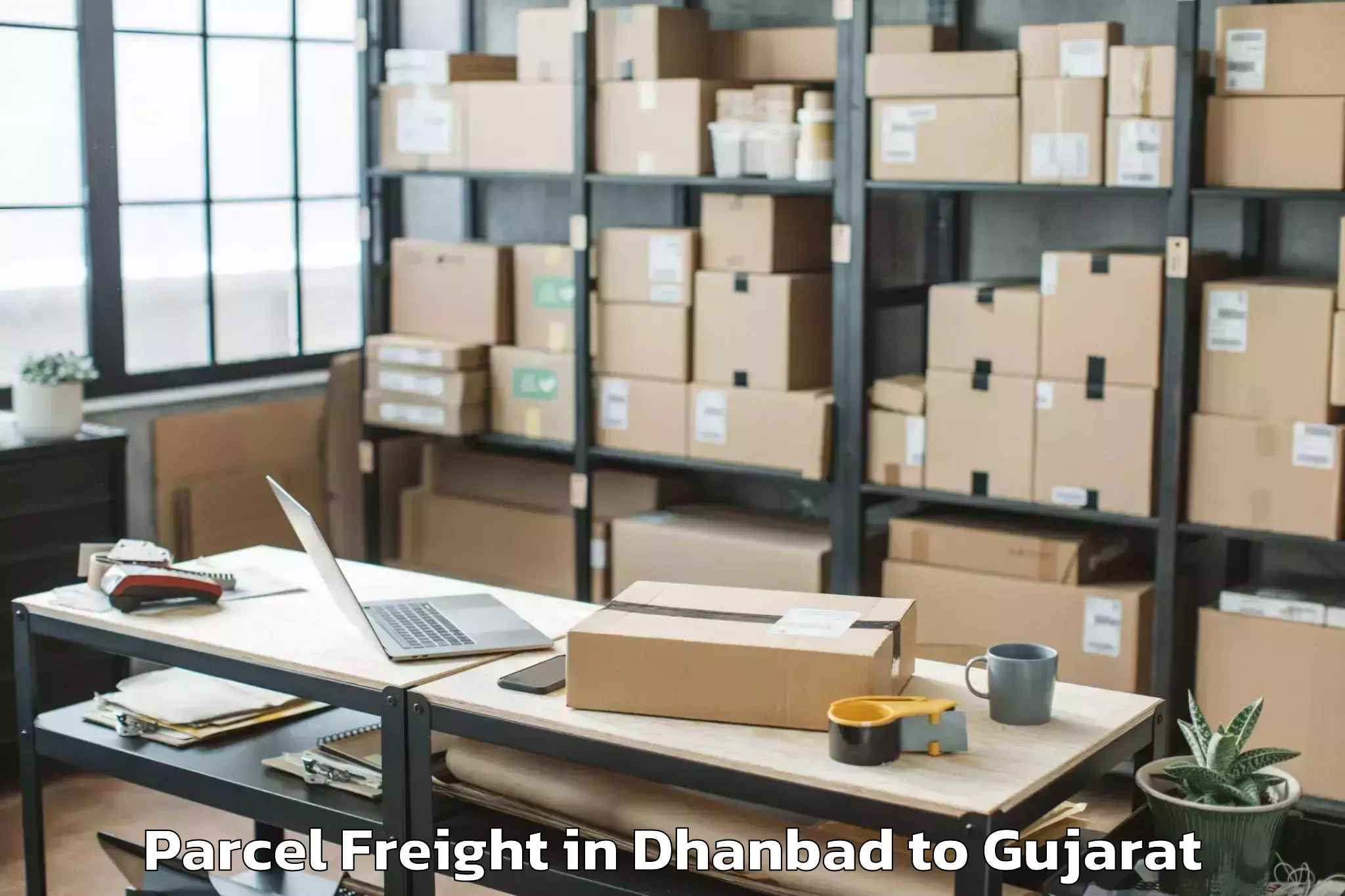 Book Your Dhanbad to Valia Parcel Freight Today